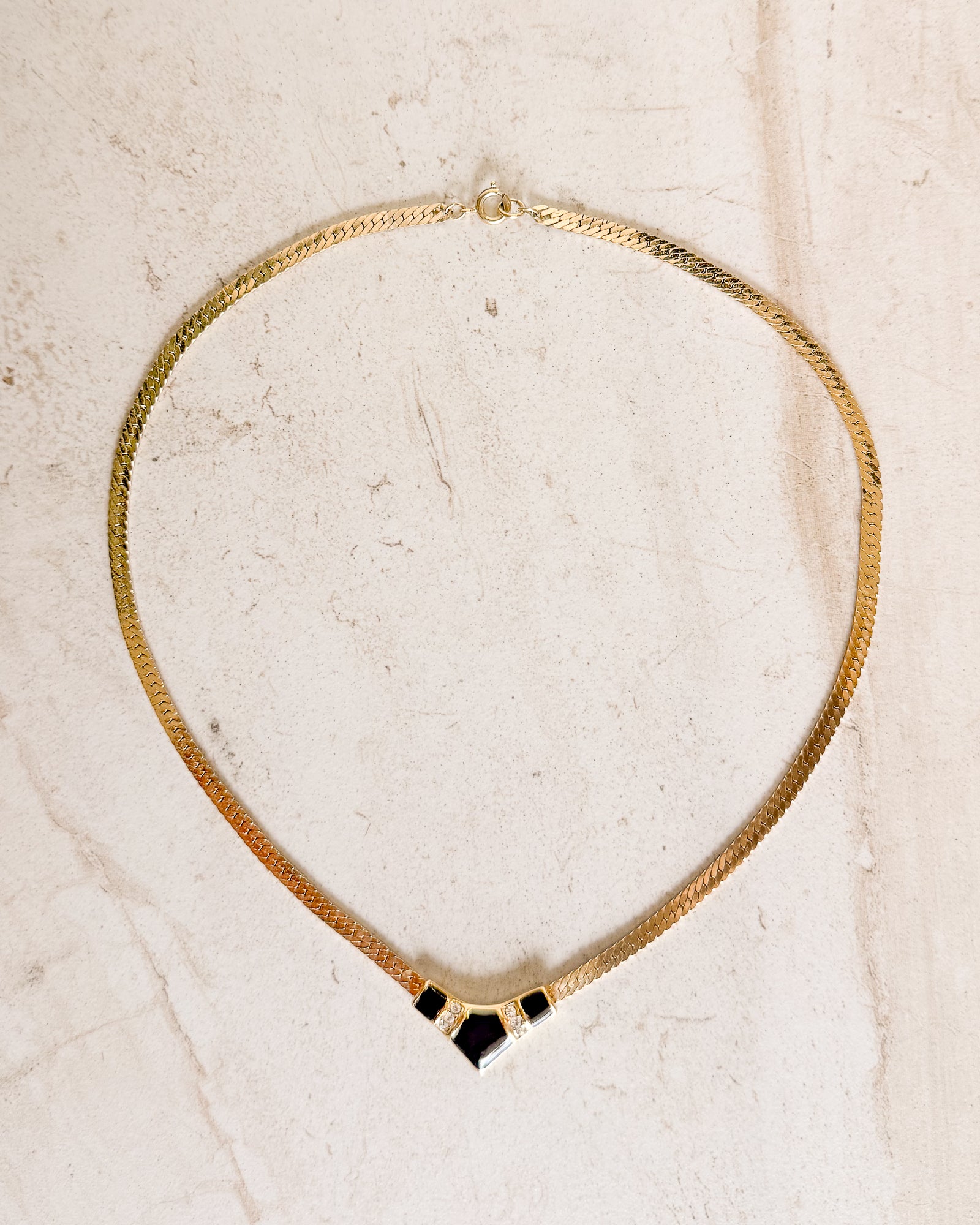 Vintage black enamel pendant gold-tone rhinestone V necklace
