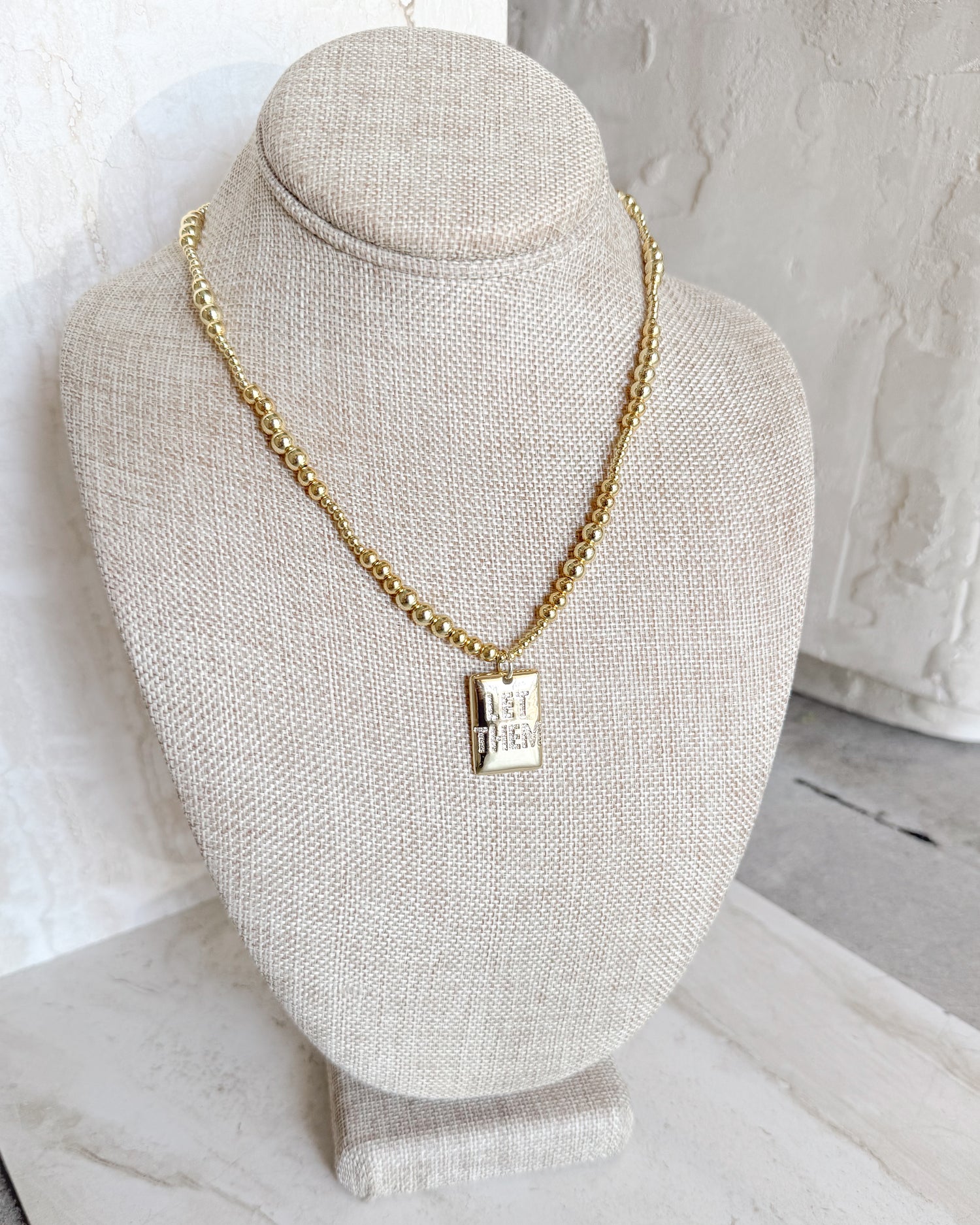 LET THEM gold beaded necklace