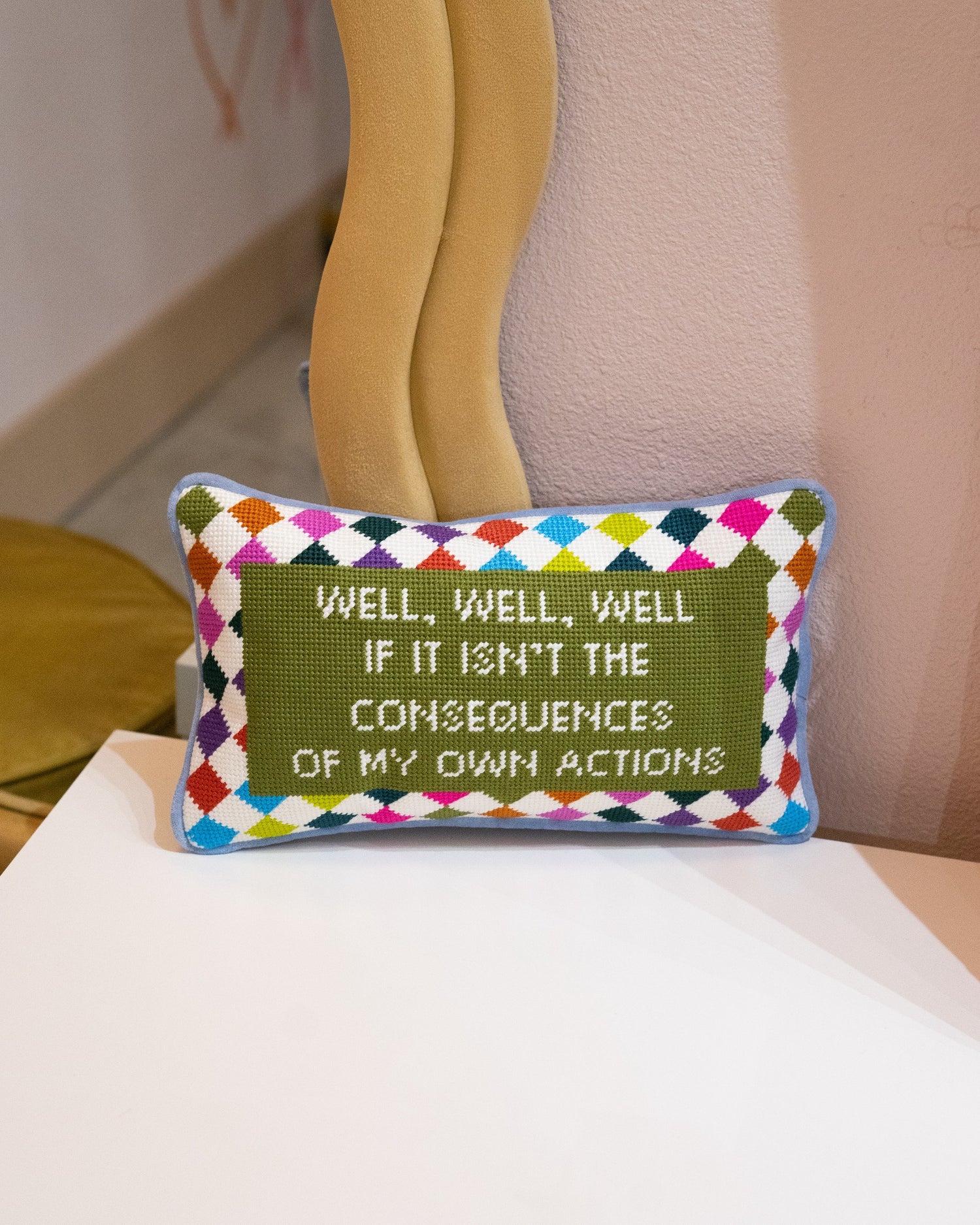 Consequences Needlepoint Pillow