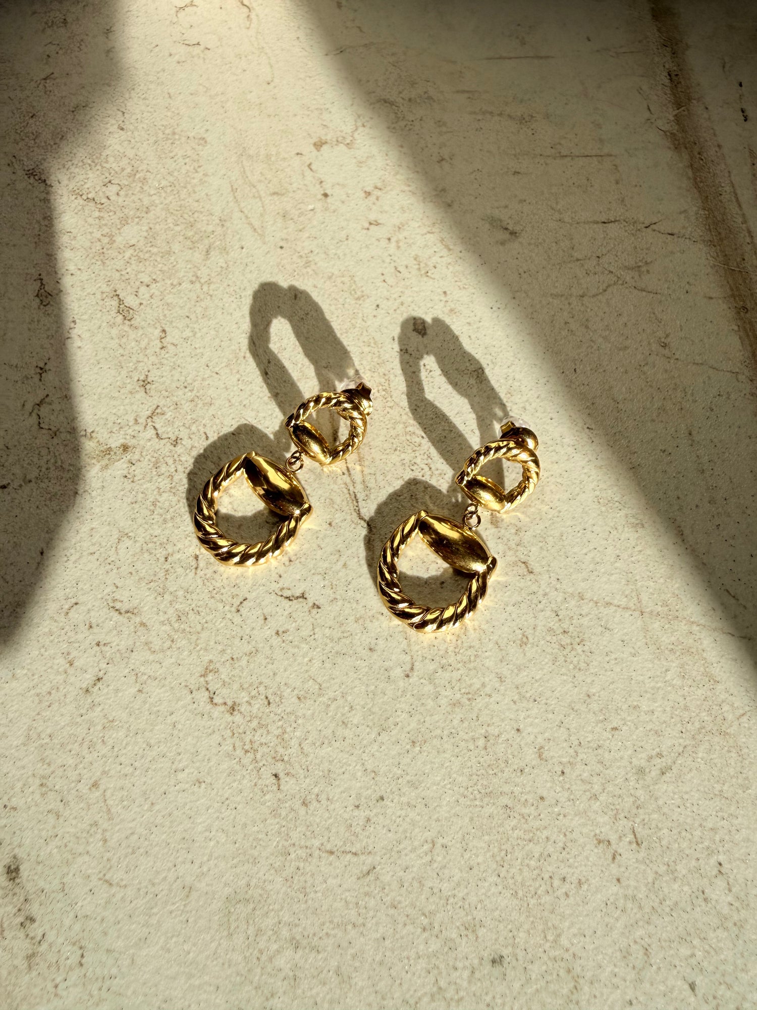 Horseshoe dangle earrings