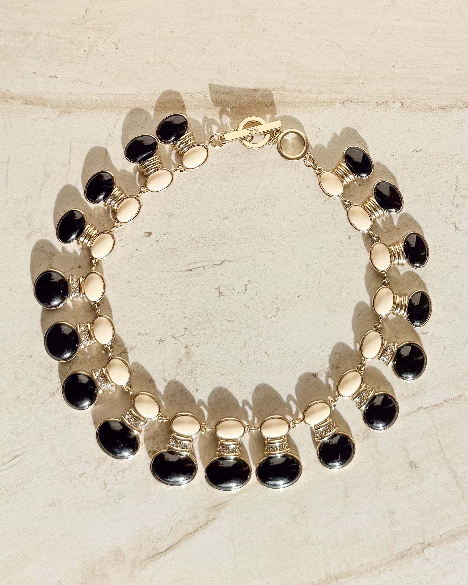 Vintage SIgned black and off-white enamel oval necklace